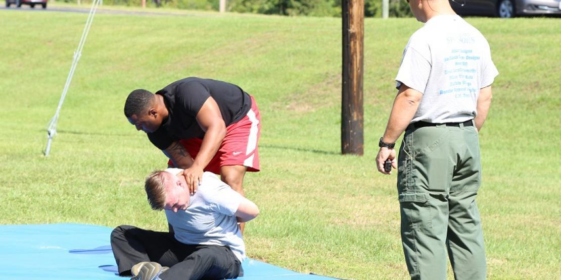 Students in the Basic Law Enforcement Training (BLET) program take part in a drill that tests their ability to do their job efficiently after being pepper sprayed. BLET is one of several programs currently registering students at Craven CC.