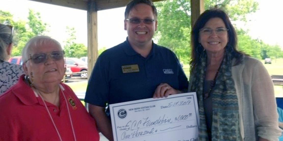 Dr. Alec Newton, Craven CC dean of health programs, is presented with a $1,000 scholarship donation from New Bern Civitan President Norma Judd, left, and member Betty Nance-Floyd, right, on Friday, May 17.