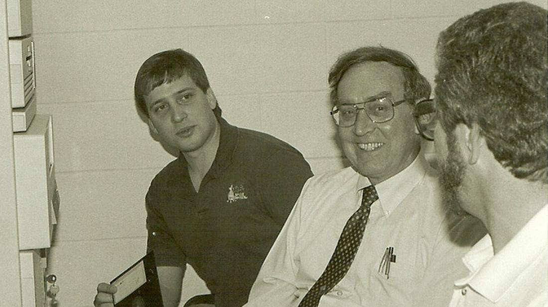 Dr. Brock with two male students in 1988