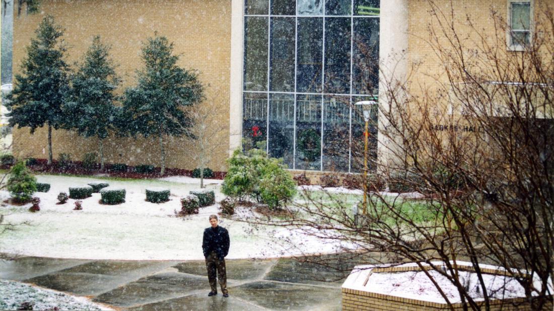 Dr. Scott Ralls in snow by Barker Hall in 2004