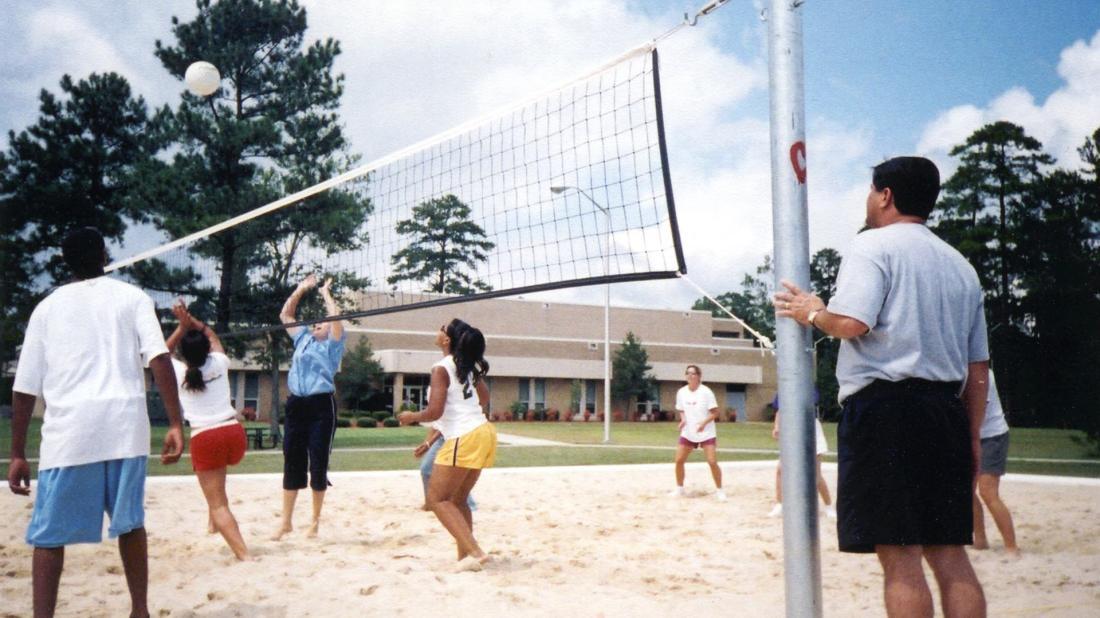 Students playing volleyball in 2000s