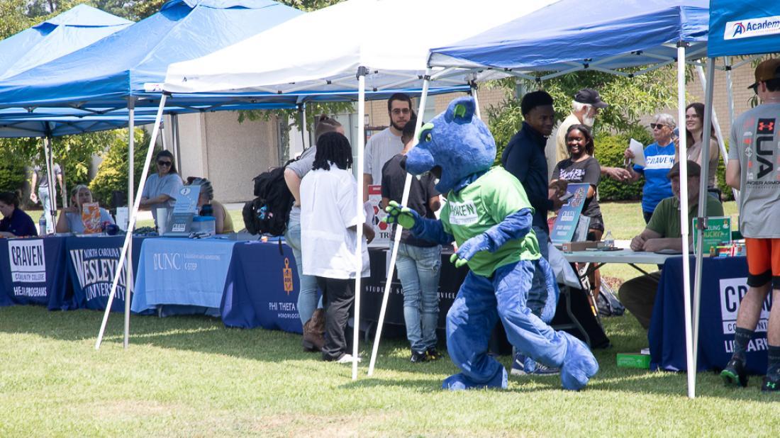 Blaze the Panther during PantherFest by tents outside