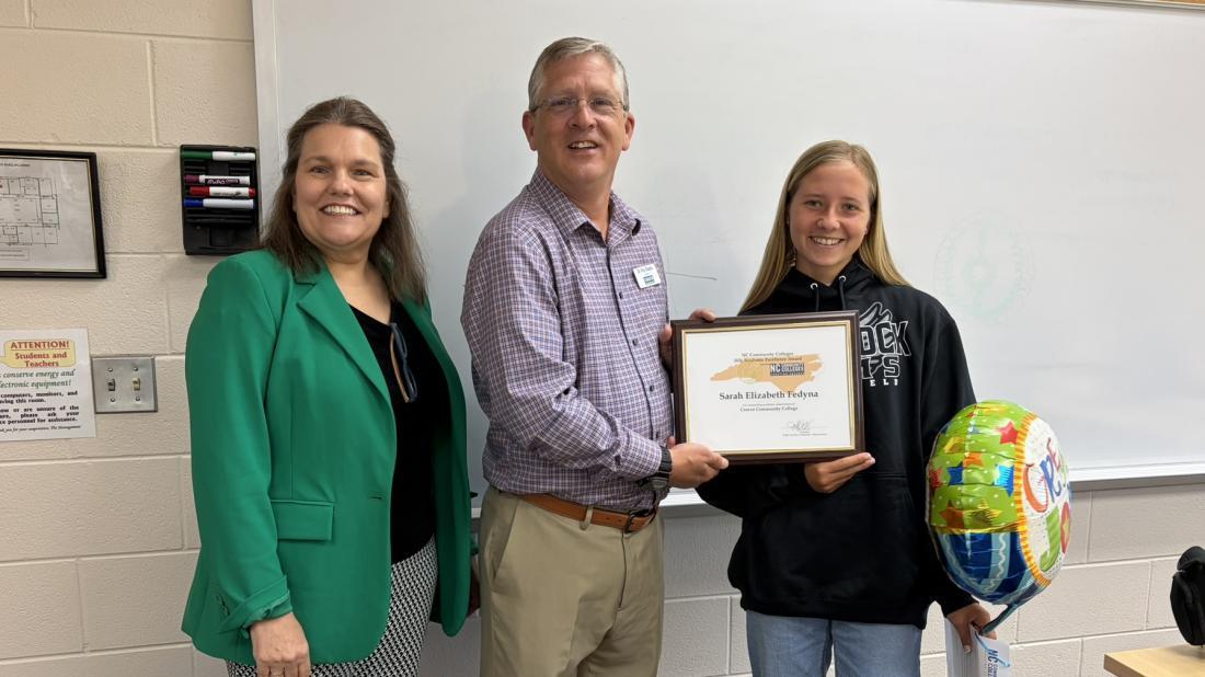 Dr. Kathleen Gallman, VP for Instruction, and Dr. Ray Staats, Craven CC President, post with NCCCS Academic Excellence Award recipient Sarah Fedyna