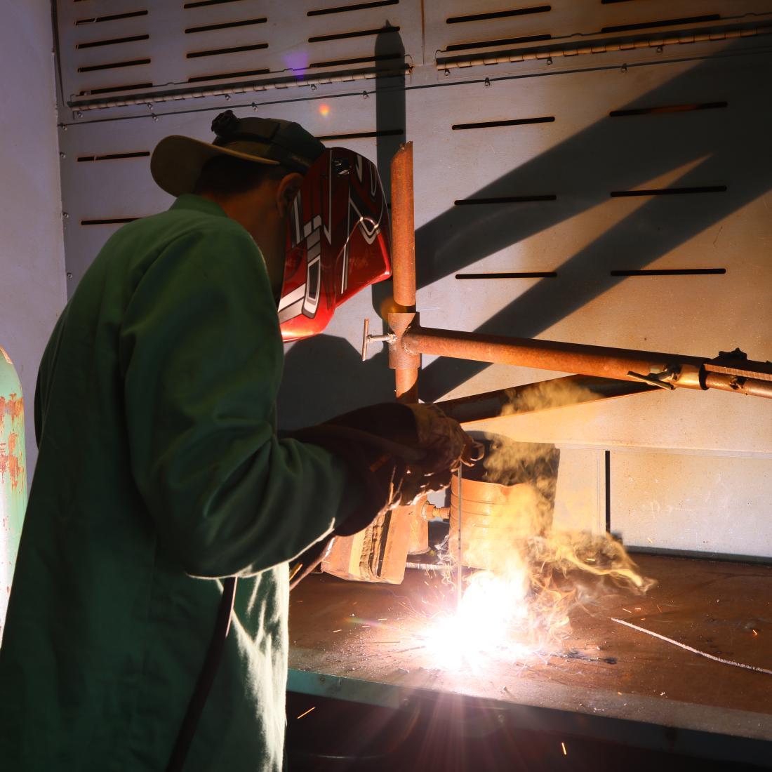 Craven CC Career & College Promise student and Havelock High School rising senior Ryan Dorsey practices welding techniques.