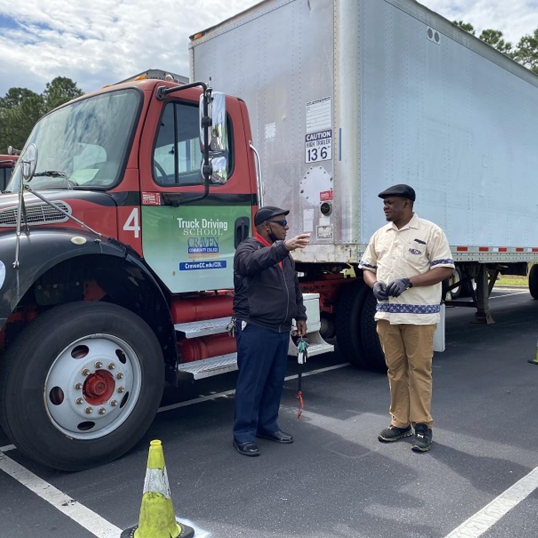 Craven CC CDL instructor Lafayette Kornegay, left, talks to student Djimmi Kabondo during the CDL training program. Through mutual partnerships, Craven CC has helped establish the CDL program of three other local community colleges. The college’s next CDL program orientation will be held Nov. 19 for the classes beginning Dec. 1, 2020 and Jan. 4, 2021.