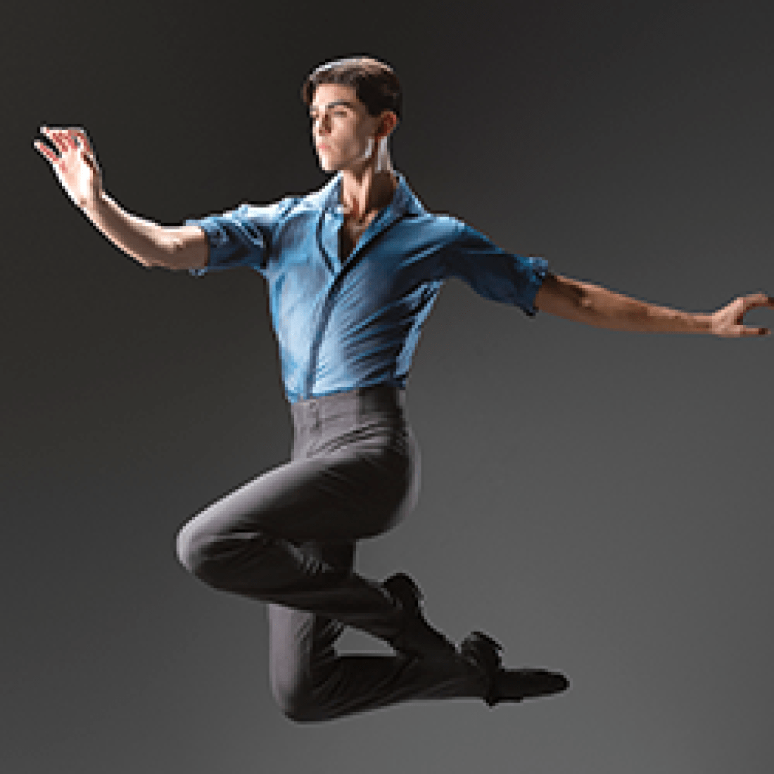Male ballet dancer leaping