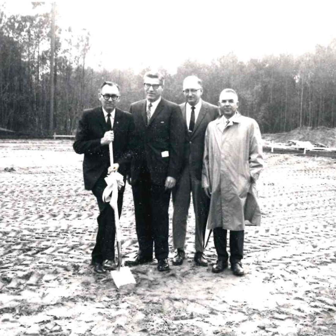 Four college officials break ground in the 1960s