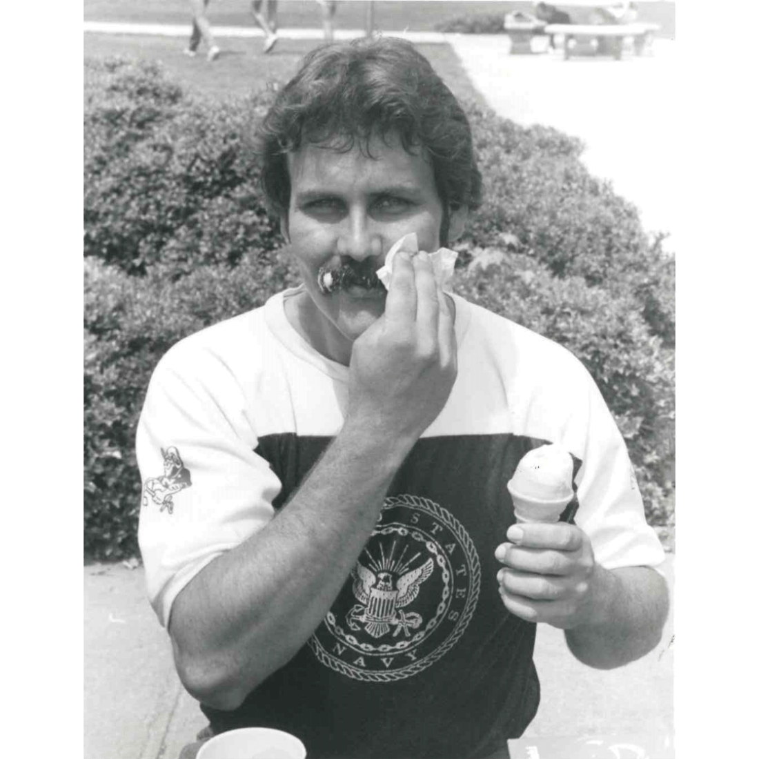 Male student with ice cream cone in 1980s