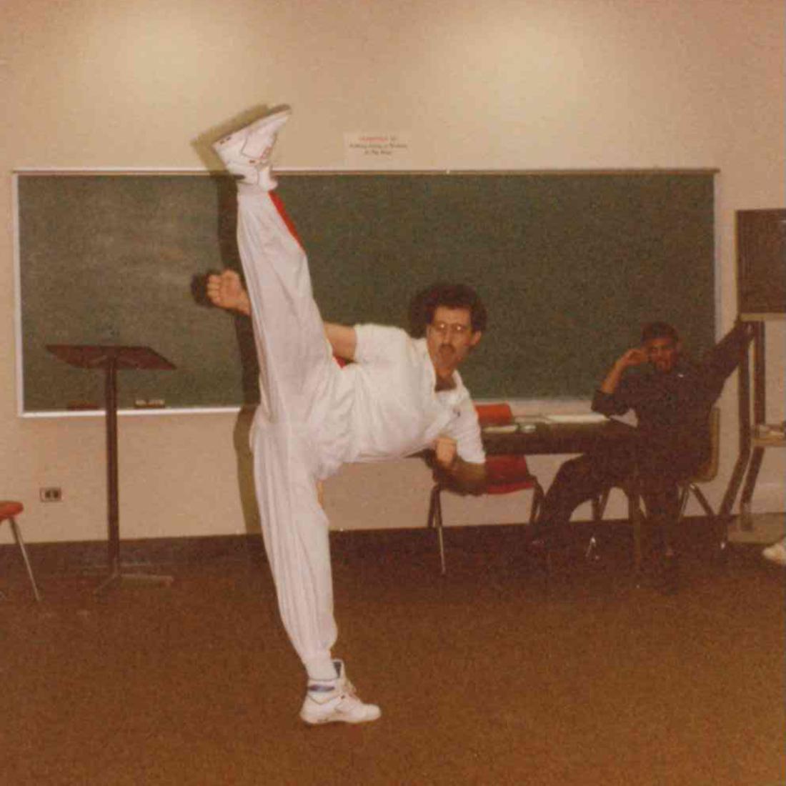 Man doing a split kick for karate demonstration in 1992