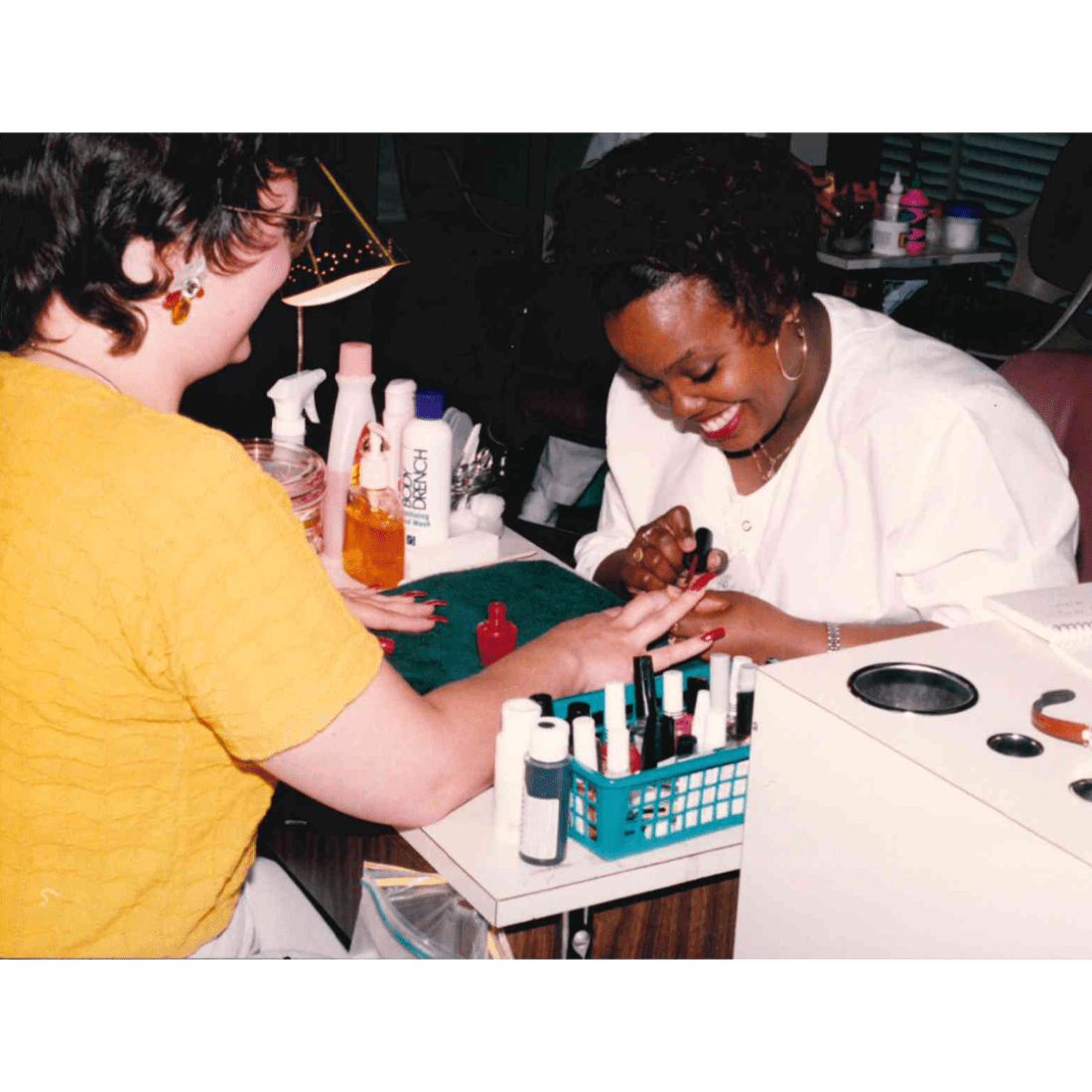 Manicurist student gives a manicure in 1994