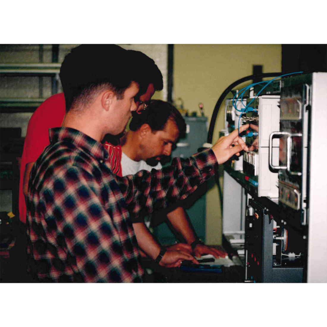 Three male machining students in 1997