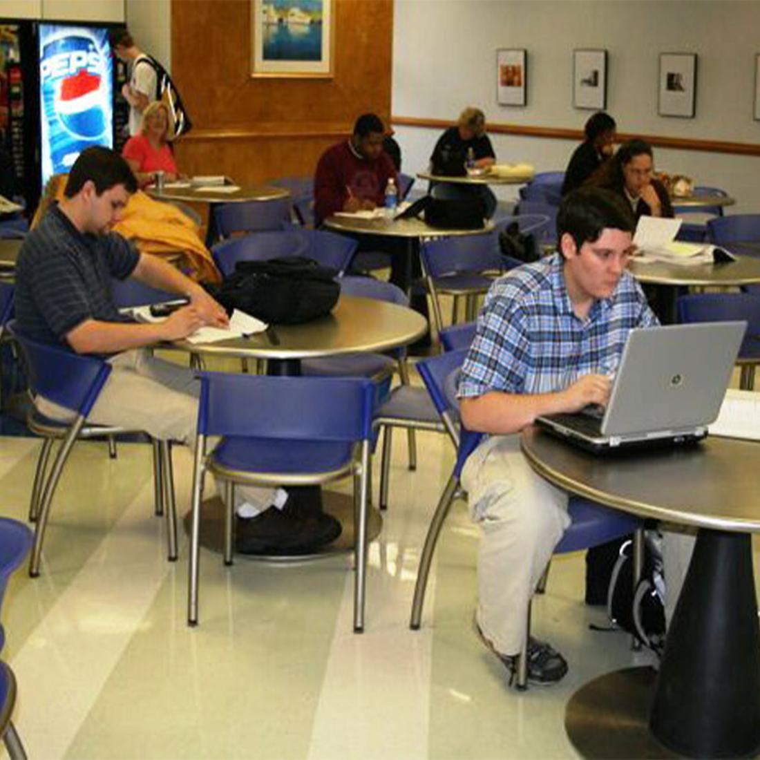 Students sitting in student lounge in 2000s