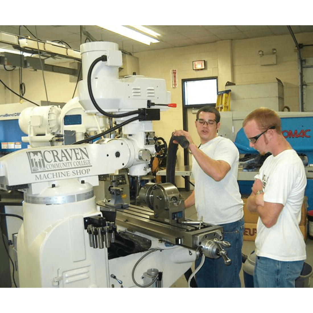 Two male machining students in 2006