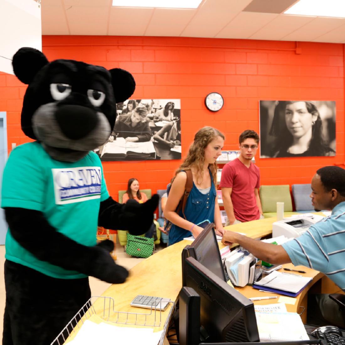 Knight the Panther and students in First Stop in 2010s