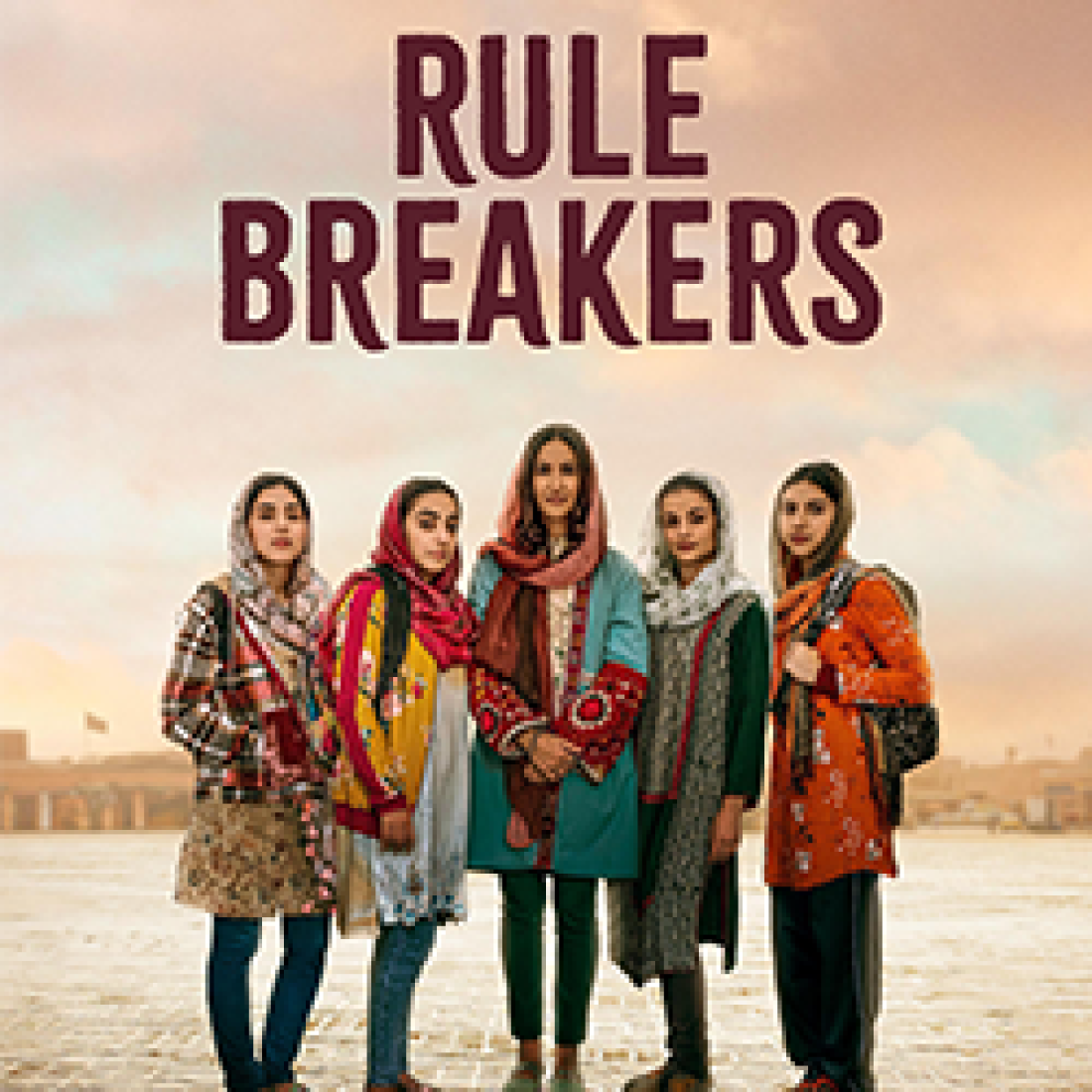 Promotional image for Rule Breakers featuring five young women standing together in a desert landscape beneath the film’s title.