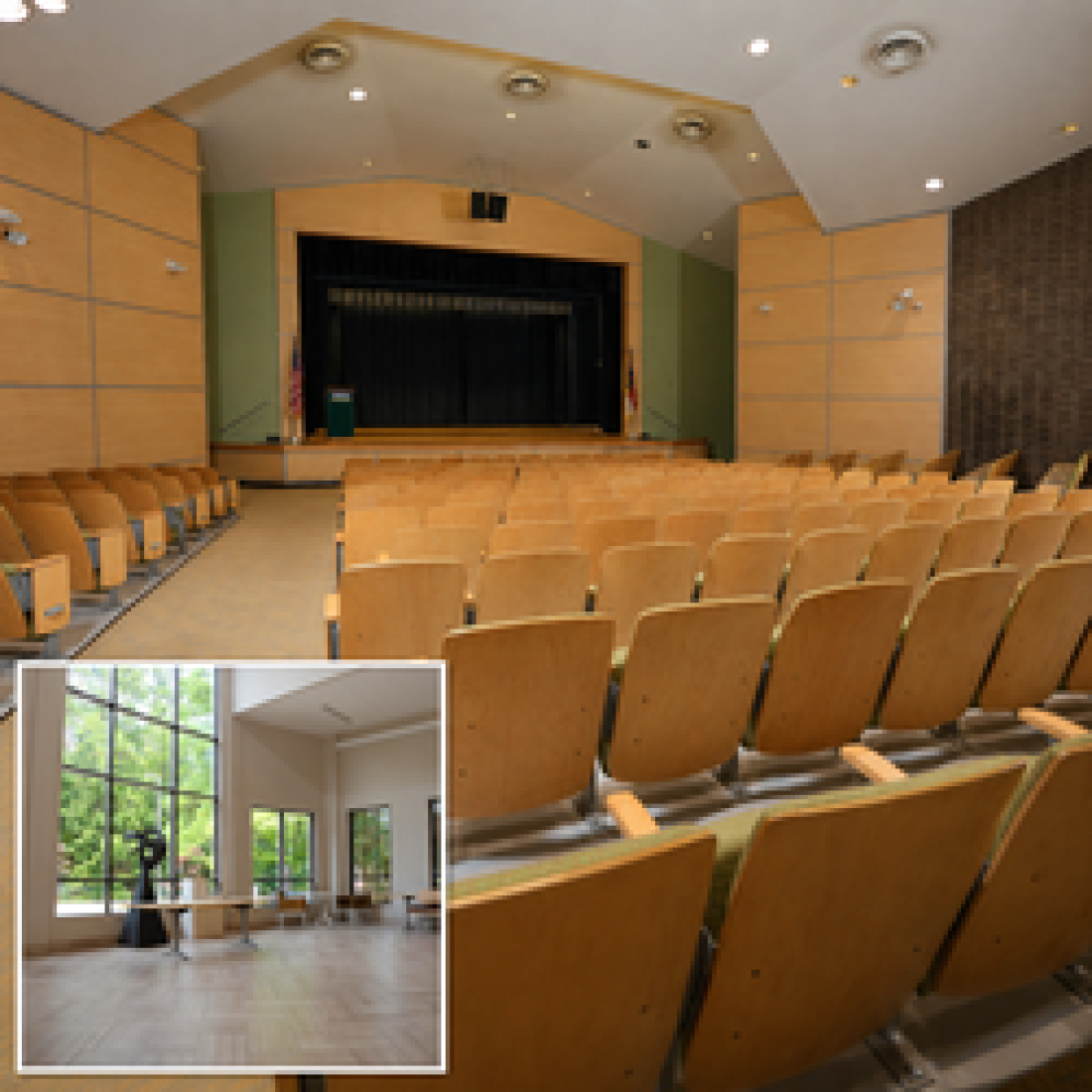 Wide view of Orringer Auditorium showing rows of fixed seating facing a raised stage with black curtains, podium, and flags, with an inset view of the adjoining lobby featuring floor-to-ceiling windows, tables, seating, and a sculpture.