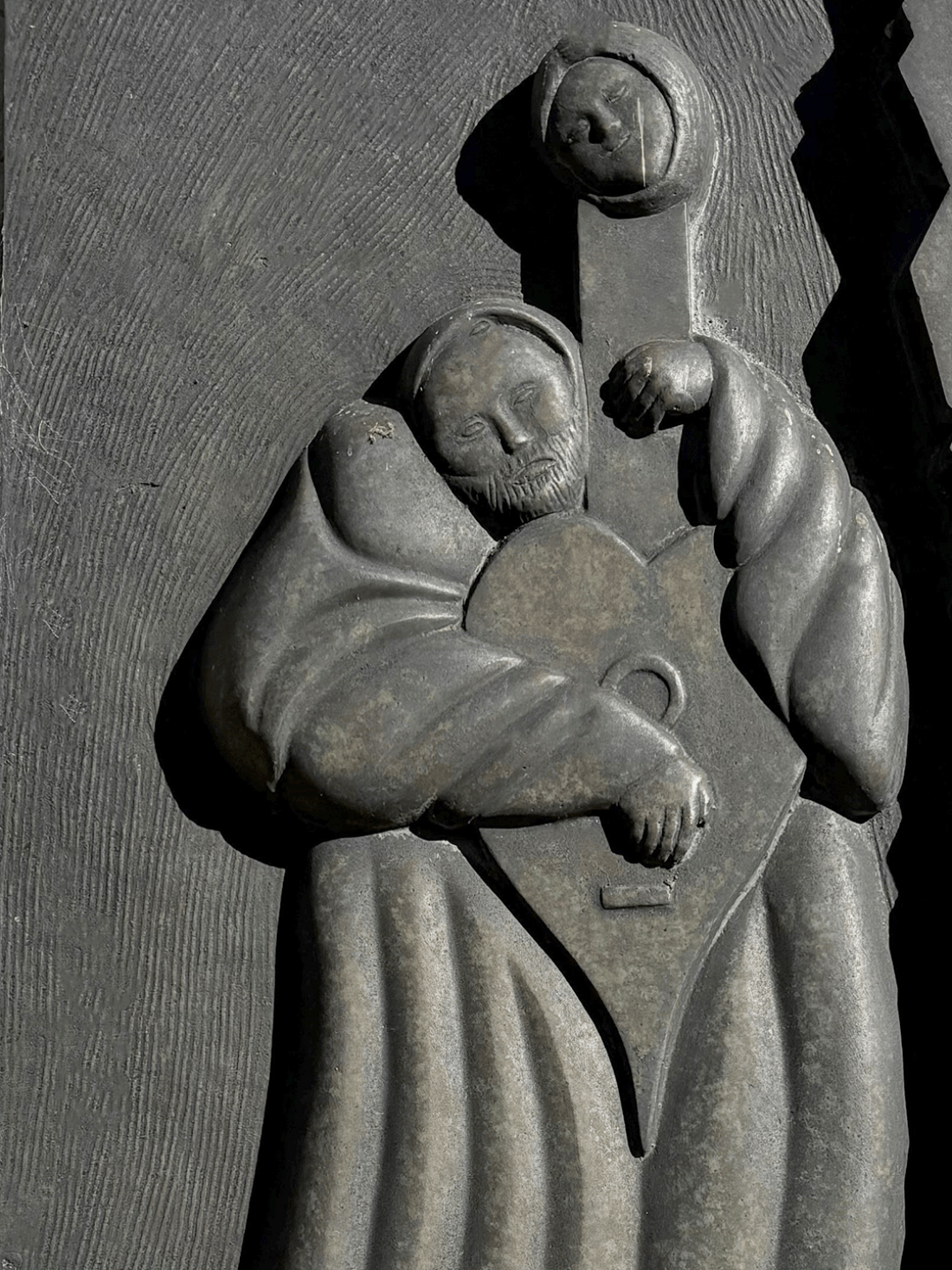 Bronze sculpture of the Virgin Mary with baby Jesus