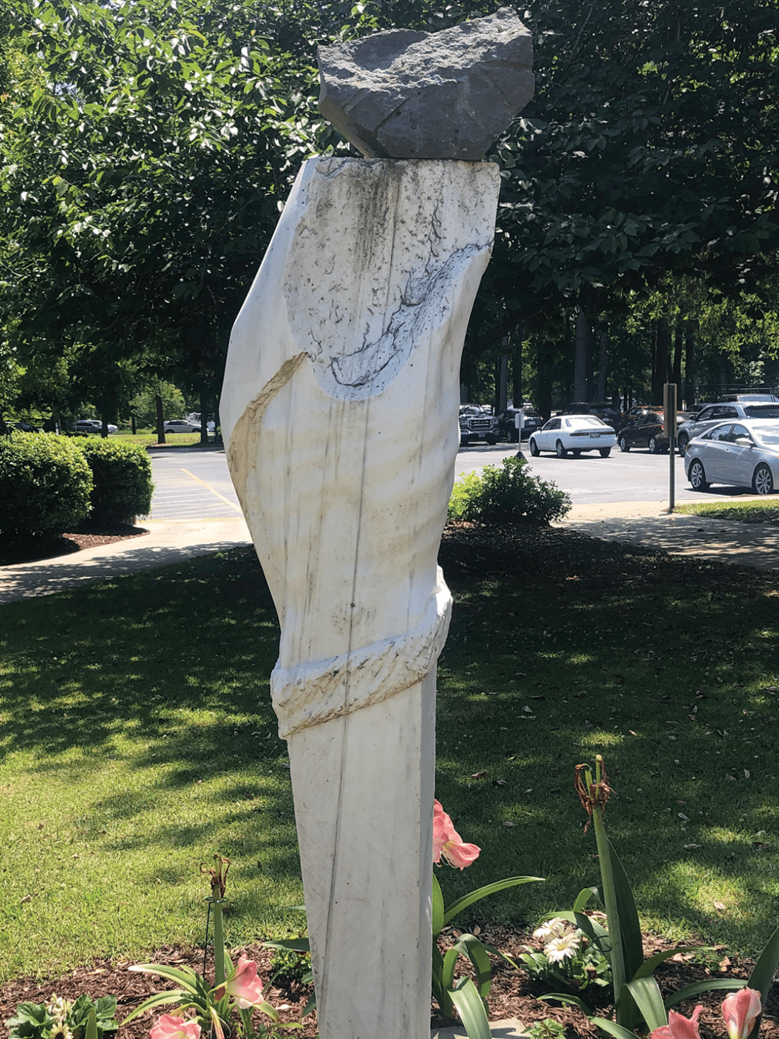 Marble and stone statue of torso