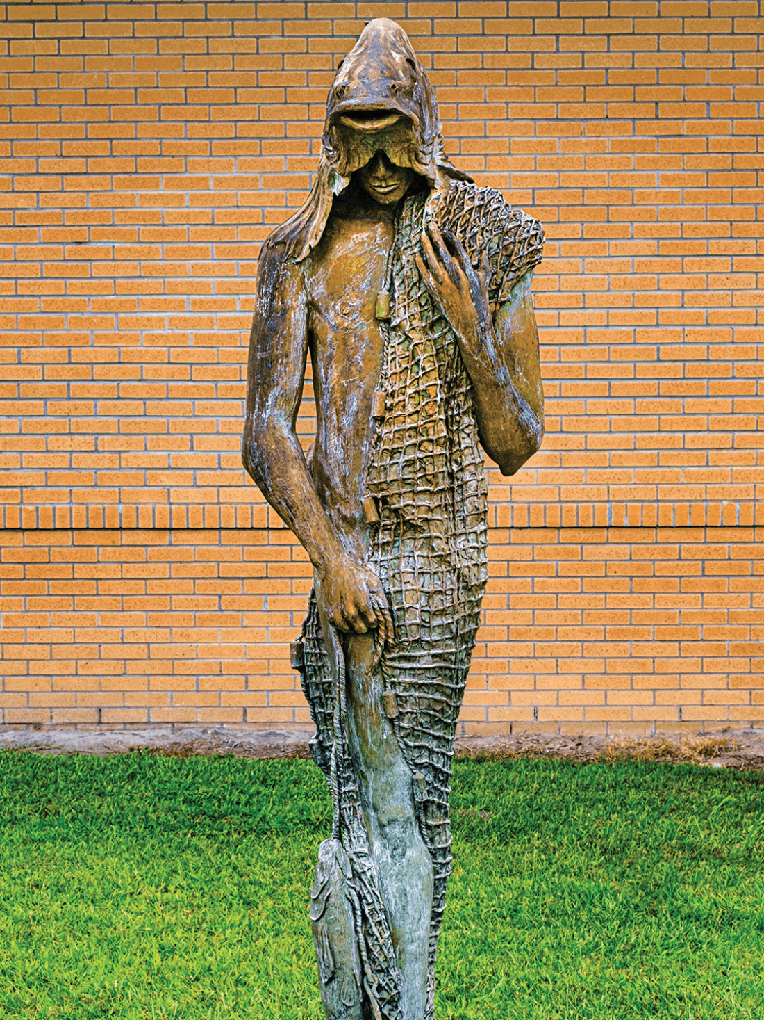 Bronze sculpture of fish-man hybrid