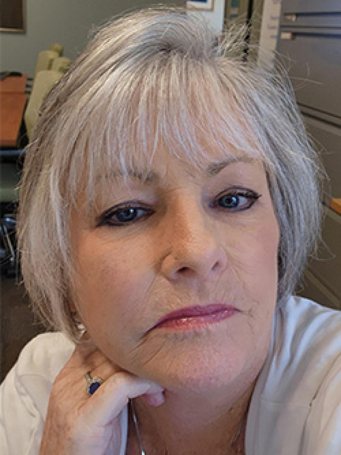 Woman sitting at desk in office space