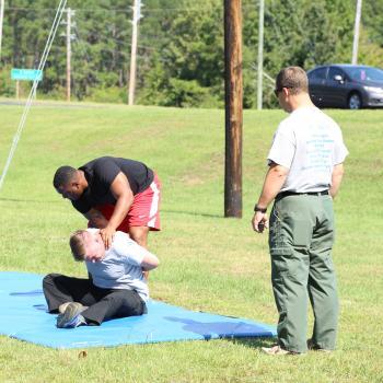 Basic Law Enforcement Training students practice arrests after being pepper sprayed