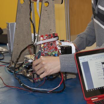 Student works on wiring project