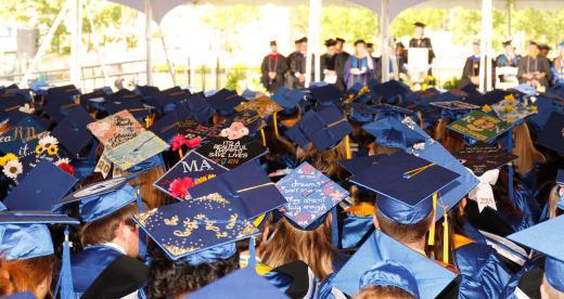 top of graduate caps decorated at graduation