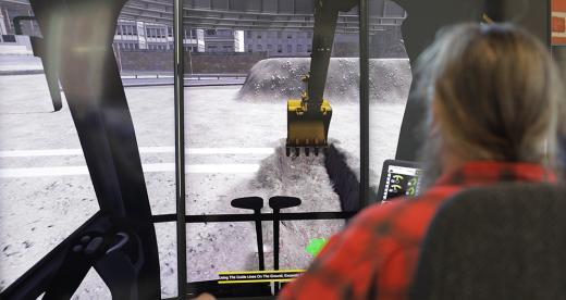 Man uses excavator simulator