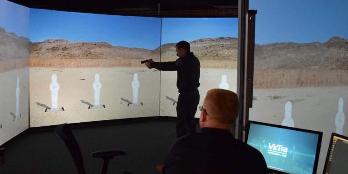 Craven CC has collaborated with the City of New Bern to provide local law enforcement agencies with a new Law Enforcement Simulator Training program, which will utilize a state-of-the-art training simulator. Pictured is Sgt. Billy Zerby of the New Bern Police Department demonstrating a training scenario.