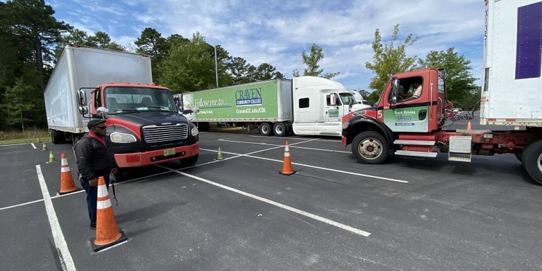 Craven CC CDL instructor Lafayette Kornegay watches as student Djimmi Kabondo practices behind the wheel. Through mutual partnerships, Craven CC has helped establish the CDL program of three other local community colleges. The college’s next CDL program orientation will be held Nov. 19 for the classes beginning Dec. 1, 2020 and Jan. 4, 2021.