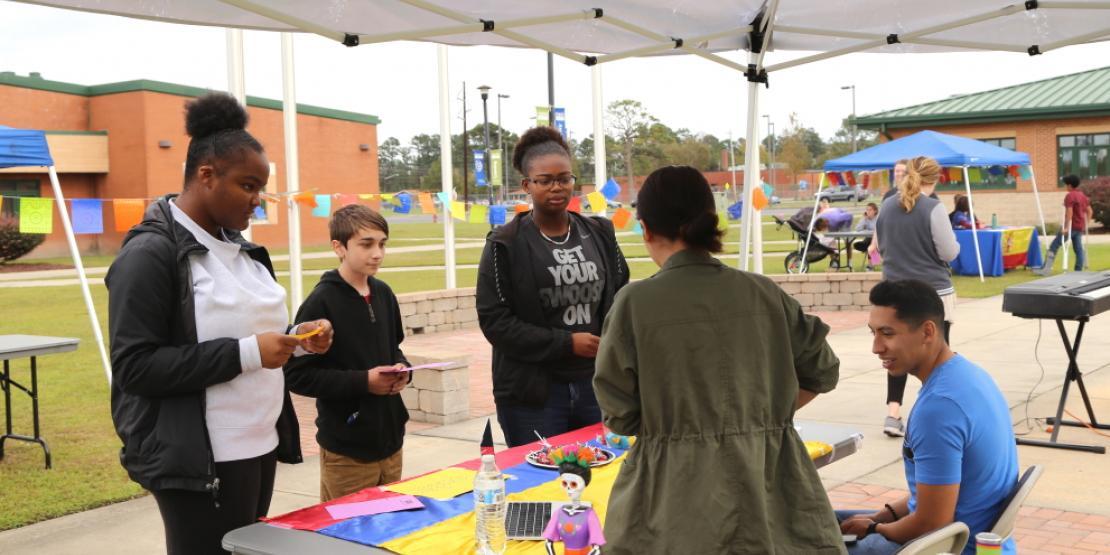 Students enjoy learning about Hispanic cultures during Craven CC’s International Fest on the Havelock campus. The college hosted the event on both campuses to celebrate Hispanic Heritage Month. (Photo by Meredith Laskovics)