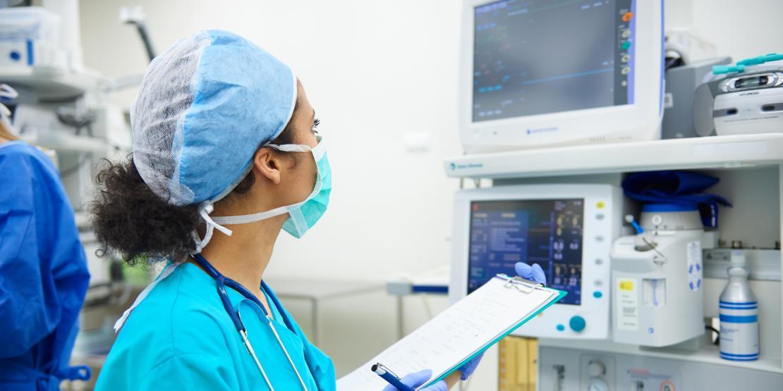 Cardio/EKG nurse monitors EKG screen