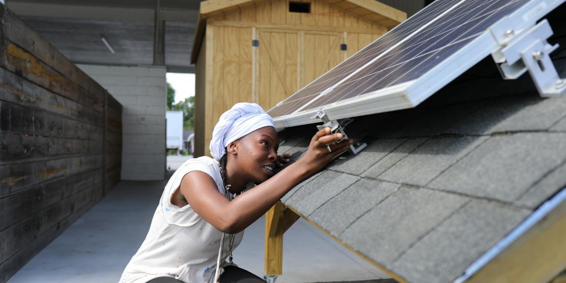 Female student in solar photovoltaic class