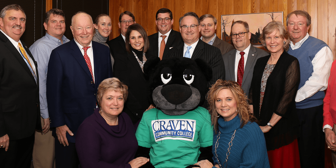 Craven CC Foundation's sponsors for the Community Fabric Awards pose with college panther mascot