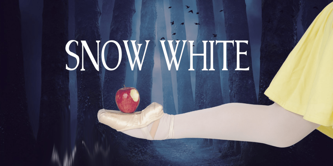 Snow White text with an apple with a bite taken out of it atop a woman's foot in ballet slipper 