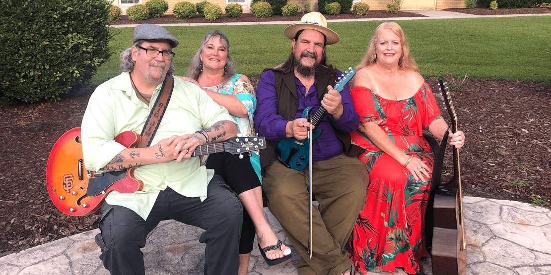 LLC group photo of four musical performers