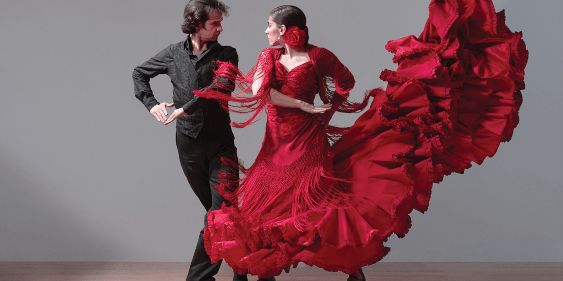 A man and woman dancing flamenco