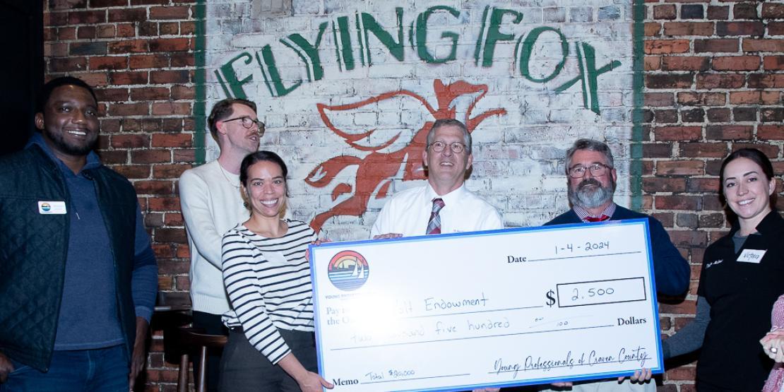 Craven CC received a $2,500 donation from the Young Professionals (YP) of Craven County on Jan. 4. Pictured L-R: YP members Brandon Joyner, Bryan Wayne, and Sally Deschamps Stroud; Craven CC President Dr. Ray Staats; Craven CC VP for Development Dr. Gery Boucher; and YP member Victoria Hardy McGowen.