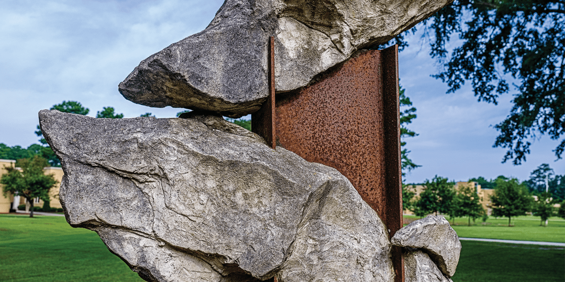 Welded steel, fiber glass, and steel reinforced concrete statue