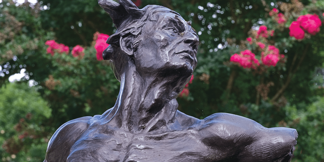 Bronze statue of male head and torso