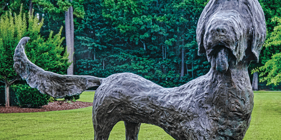 Bronze dog sculpture