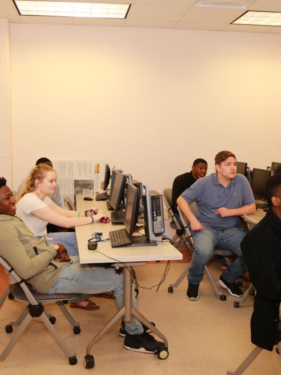 Students in grant writing class at desks