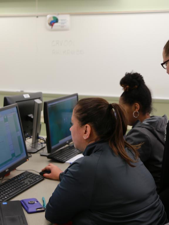Health Information Technology students on computers