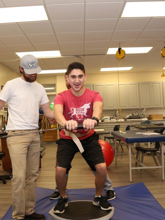 Physical Therapy students practice balance exercises