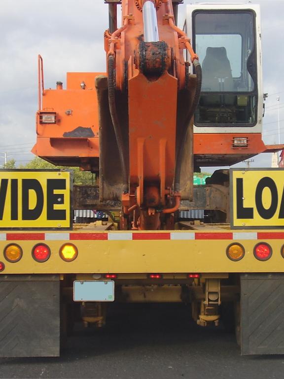 back of large truck that reads "wide load"