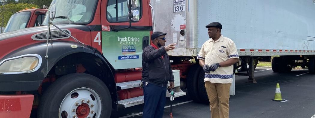 Craven CC CDL instructor Lafayette Kornegay, left, talks to student Djimmi Kabondo during the CDL training program. Through mutual partnerships, Craven CC has helped establish the CDL program of three other local community colleges. The college’s next CDL program orientation will be held Nov. 19 for the classes beginning Dec. 1, 2020 and Jan. 4, 2021.
