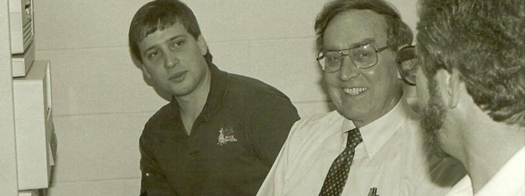 Dr. Brock with two male students in 1988