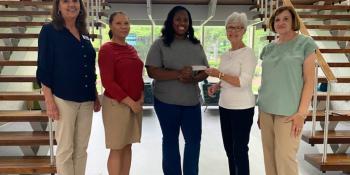 Pictured left to right: Craven CC Financial Aid Advisor Carolyn Ward, AAUW Co-President Aeleen Sherzer, student Shaundel Godfrey, AAUW Scholarship Co-Chair Ann Corby, and AAUW Co-President and Scholarship Co-Chair Theresa Harigan.