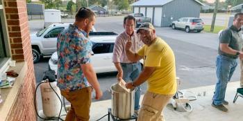 Students in Craven CC’s Introduction to Homebrewing class enjoy brewing beer as the sun sets. The next class will begin Feb. 18 at the Volt Center.