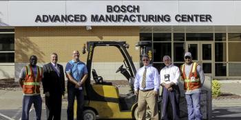 Team members from BSH Home Appliances Corporation and Craven Community College (Craven CC) stand in front of the BSH Advanced Manufacturing Center with a clamshell forklift that BSH donated to the college’s Manufacturing Career Pathway program on Nov 7. Pictured, left to right: BSH Receiving Supervisor Berete Gulledge, Craven CC Foundation Executive Director Charles Wethington, BSH Central Distribution Center Manager Jeffery Martin, Craven CC Vice President for Students Gery Boucher, Craven CC Executive Dir